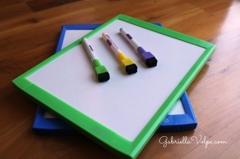 small white board and markers for circle activity for child with special needs